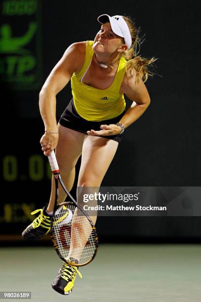 Melanie Oudin of the United States serves against Michaella Krajicek of the Netherlands during day two of the 2010 Sony Ericsson Open at Crandon Park...