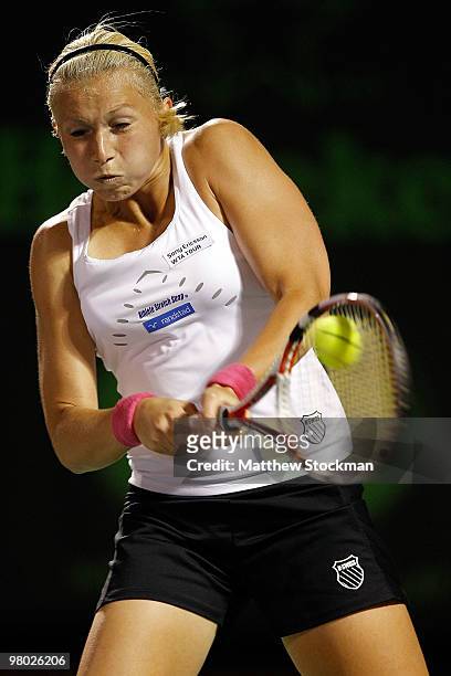 Michaella Krajicek of the Netherlands returns a shot against Melanie Oudin of the United States during day two of the 2010 Sony Ericsson Open at...