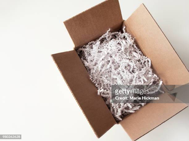 eco friendly packaging, cardboard and shredded paper. - marie hickman stock-fotos und bilder