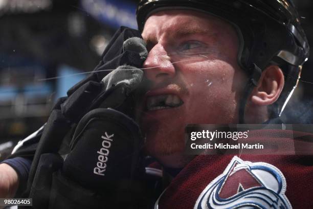 Cody McLeod of the Colorado Avalanche is hit in the face during a game against the Los Angeles Kings at the Pepsi Center on March 24, 2010 in Denver,...