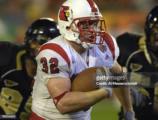 Louisville fullback Brock Bolen rushes for a go-ahead touchdown against Wake Forest Jan. 2, 2007 in the 73rd annual FedEx Orange Bowl in Miami....