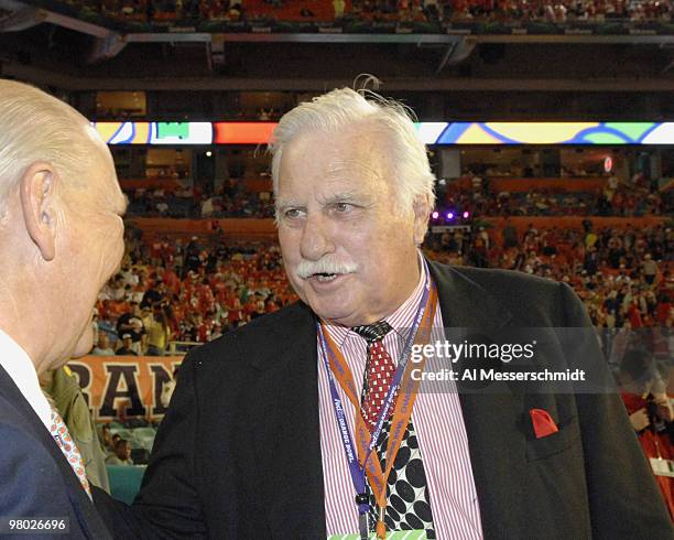 Florida Atlantic University coach Howard Schnellenberger talks to Miami Dolphins owner Wayne Huizenga during the 73rd annual FedEx Orange Bowl...