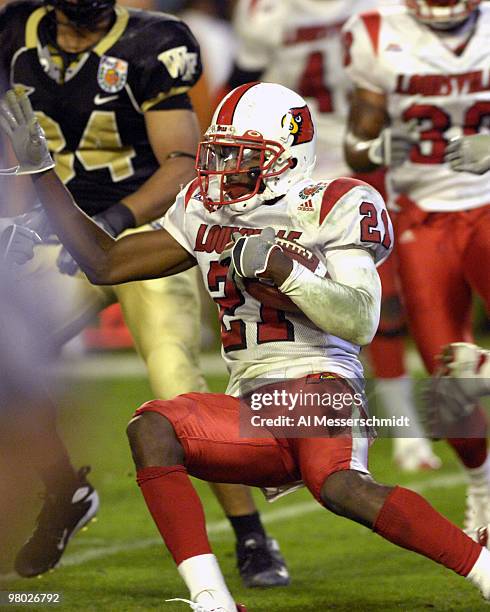 Louisville cornerback William Gay intercepts a pass during the 73rd annual FedEx Orange Bowl between Louisville and Wake Forest at Dolphin Stadium in...