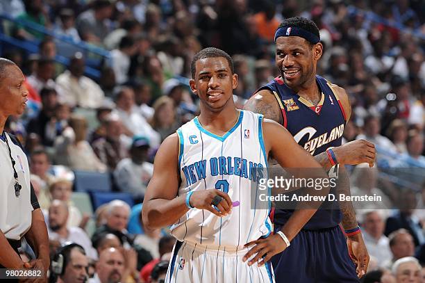 Le Bron James of the Cleveland Cavaliers and Chris Paul of the New Orleans Hornets at the New Orleans Arena on March 24, 2010 in New Orleans,...