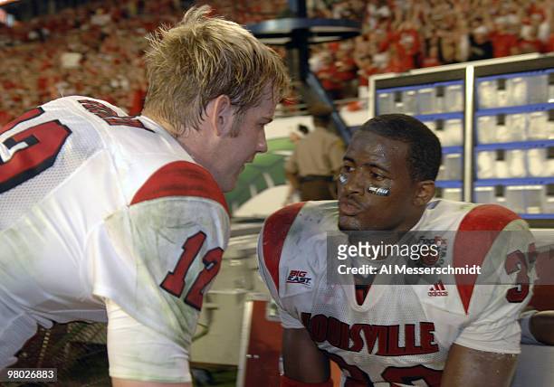 Louisville quarterback Brian Brohm on the sidelines with running back Kolby Smith during the 73rd annual FedEx Orange Bowl between Louisville and...