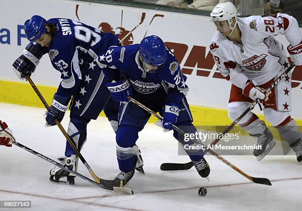 Edmonton Oilers forward Ryan Smyth and Anaheim Ducks forward Andy McDonald battle for the puck at the 2007 NHL All-Star game Jan. 24 in Dallas.