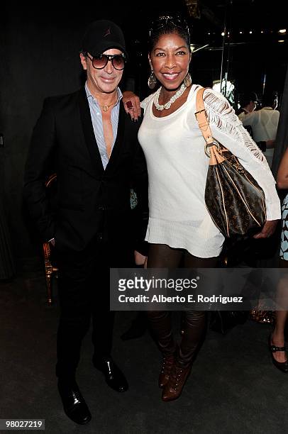 Designer Lloyd Klein and singer Natalie Cole pose at 'A Parisian Afternoon' hosted by The House of Lloyd Klein Couture on March 24, 2010 in Los...