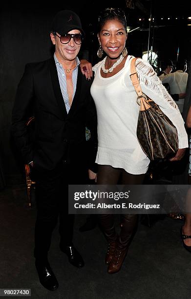 Designer Lloyd Klein and singer Natalie Cole pose at 'A Parisian Afternoon' hosted by The House of Lloyd Klein Couture on March 24, 2010 in Los...