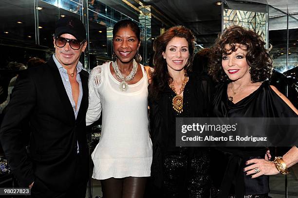 Fashion designer Lloyd Klein, singer Natalie Cole, jewelry designer Angela Tassoni-Newley and actress Joan Collins pose at 'A Parisian Afternoon'...