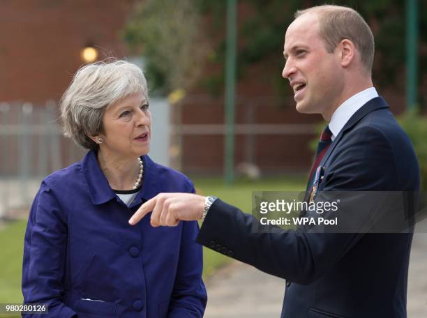 Prime Minister Theresa May tallks with Prince William, Duke of Cambridge during the official handover to the nation of the newly built Defence and...