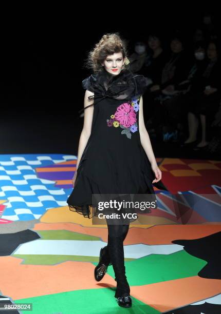 Model showcases designs by Atsuko Maeda during the Tokyo Fashion Week on March 24, 2010 in Tokyo, Japan.