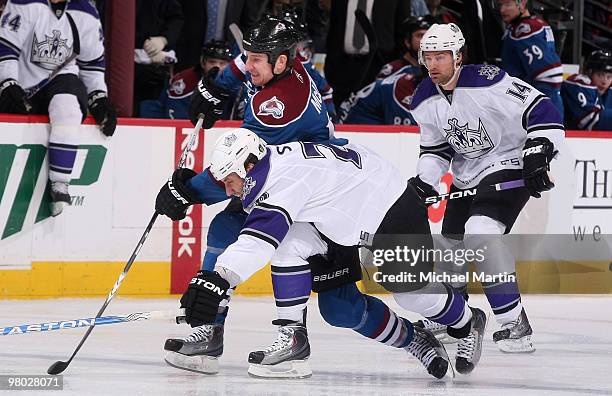 Cody McLeod of the Colorado Avalanche skates against Jarret Stoll of the Los Angeles Kings at the Pepsi Center on March 24, 2010 in Denver, Colorado.