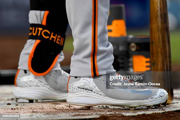 View of the baseball cleats worn by Andrew McCutchen of the San Francisco Giants as he waits on deck in the seventh inning of the game against the...