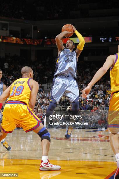 Mayo of the Memphis Grizzlies shoots a fade away against Devan George of the Golden State Warriors on March 24, 2010 at Oracle Arena in Oakland,...