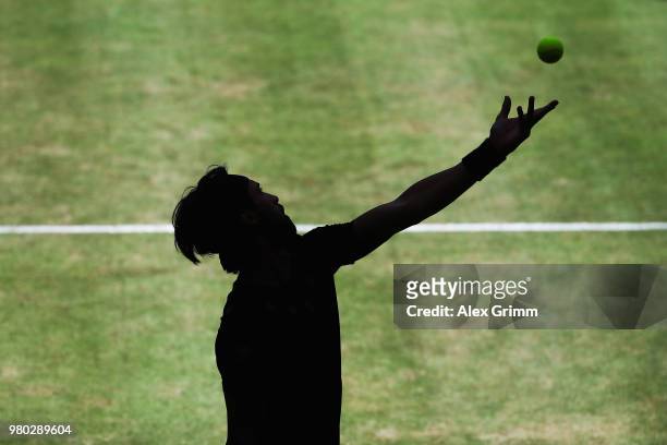 Nikoloz Basilashvili of Georgia serves the ball to Borna Coric of Croatia during their round of 16 match on during day 4 of the Gerry Weber Open at...