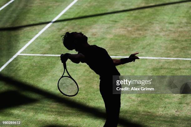Nikoloz Basilashvili of Georgia serves the ball to Borna Coric of Croatia during their round of 16 match on during day 4 of the Gerry Weber Open at...