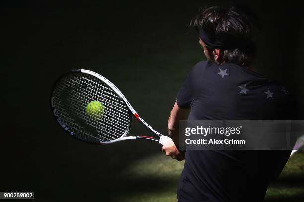 Nikoloz Basilashvili of Georgia plays a backhand to Borna Coric of Croatia during their round of 16 match on during day 4 of the Gerry Weber Open at...