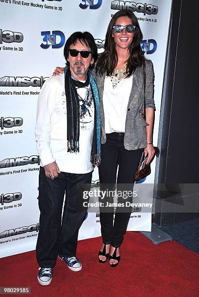 Peter Criss and Hillary Rhoda attend the first hockey game in 3D telecast viewing party at Madison Square Garden on March 24, 2010 in New York City.