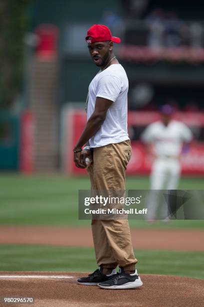 Entertainer Jay Pharoah throws out the first ball prior to the game between the Milwaukee Brewers and Philadelphia Phillies at Citizens Bank Park on...