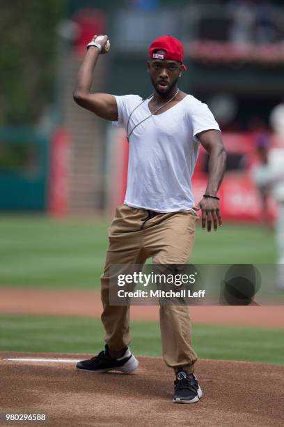 Entertainer Jay Pharoah throws out the first ball prior to the game between the Milwaukee Brewers and Philadelphia Phillies at Citizens Bank Park on...