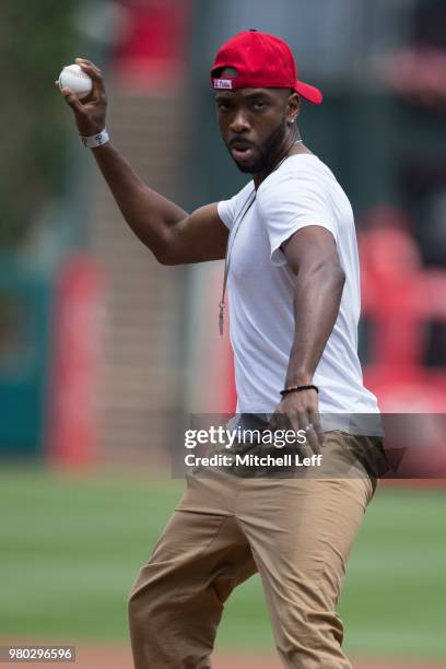 Entertainer Jay Pharoah throws out the first ball prior to the game between the Milwaukee Brewers and Philadelphia Phillies at Citizens Bank Park on...