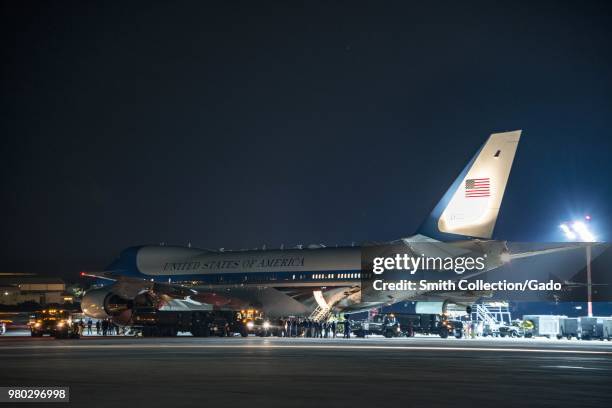 Nighttime photograph of Air Force One being refuelled en-route to Singapore, Naval Support Activity, Souda Bay, Greece, June 10, 2018. Image courtesy...