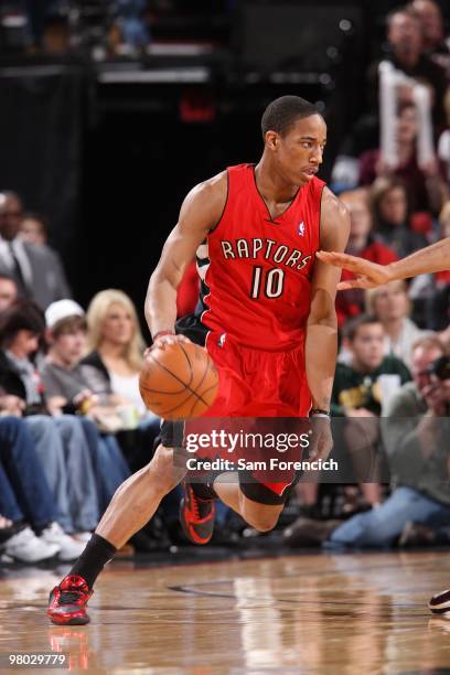 DeMar DeRozan of the Toronto Raptors makes a move with the ball during teh game against the Portland Trail Blazers at The Rose Garden on March 14,...