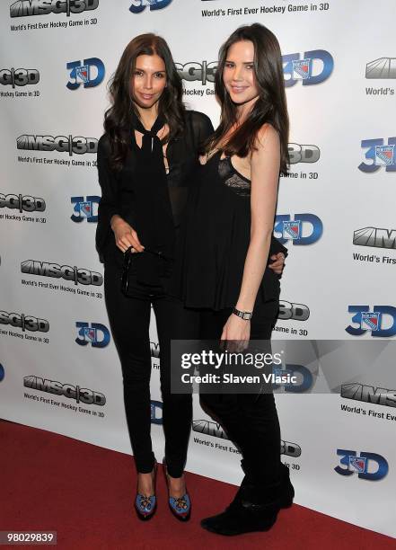 Models Alejandra Cata and Chrissy Haldis attend the first hockey game in 3D telecast viewing party at Madison Square Garden on March 24, 2010 in New...