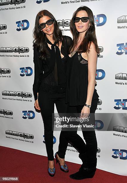 Models Alejandra Cata and Chrissy Haldis attend the first hockey game in 3D telecast viewing party at Madison Square Garden on March 24, 2010 in New...