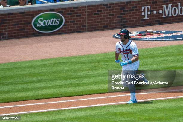 Charlie Culberson of the Atlanta Braves runs to first base against the San Diego Padres at SunTrust Park on June 17 in Atlanta, Georgia. The Braves...
