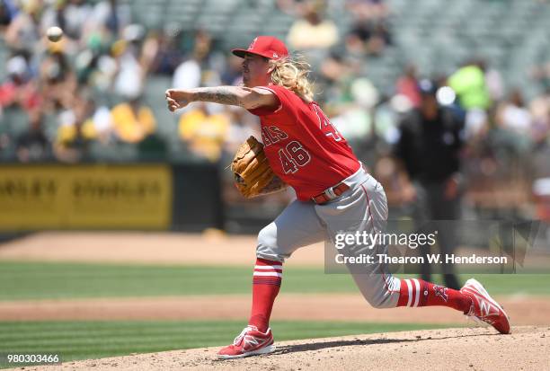 John Lamb of the Los Angeles Angels of Anaheim pitches against the Oakland Athletics in the bottom of the second inning at the Oakland Alameda...