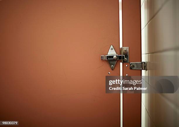 bathroom stall door and lock - public restroom stock-fotos und bilder