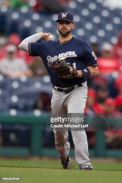 Travis Shaw of the Milwaukee Brewers throws the ball to first base against the Philadelphia Phillies at Citizens Bank Park on June 10, 2018 in...