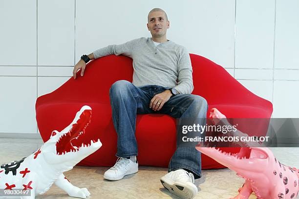 Member of pioneering French rap group IAM, Akhenaton poses on March 22, 2010 in Paris. AFP PHOTO FRANCOIS GUILLOT