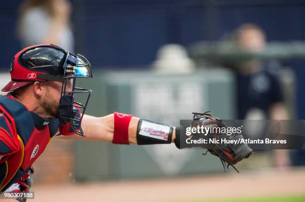 Tyler Flowers of the Atlanta Braves catches against the San Diego Padres at SunTrust Park on June 16 in Atlanta, Georgia. The Braves won 1-0.