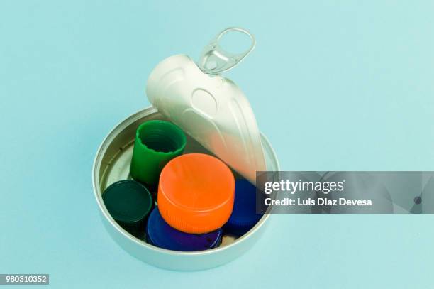 easy-to-open pull ring pulls with plastic plugs inside - ring pull stock pictures, royalty-free photos & images