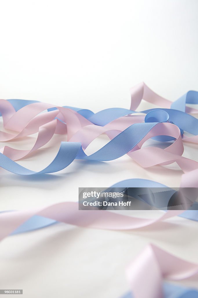 Pink and blue ribbons for baby shower party