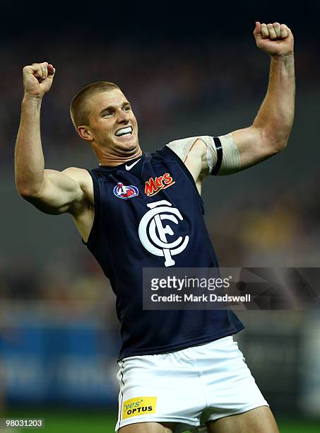 Lachie Henderson of the Blues celebrates a goal during the round one AFL match between the Richmond Tigers and Carlton Blues at Melbourne Cricket...