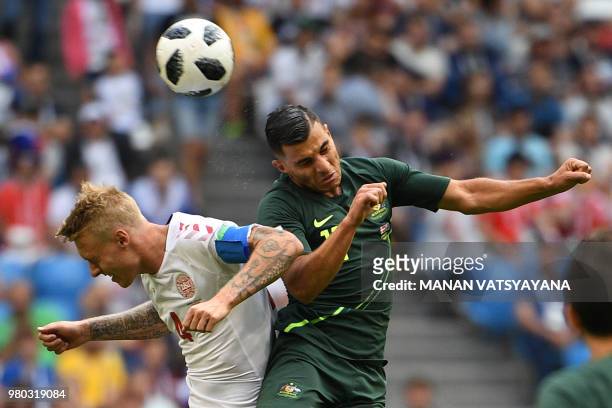 Denmark's defender Simon Kjaer and Australia's forward Andrew Nabbout go up for a header during the Russia 2018 World Cup Group C football match...