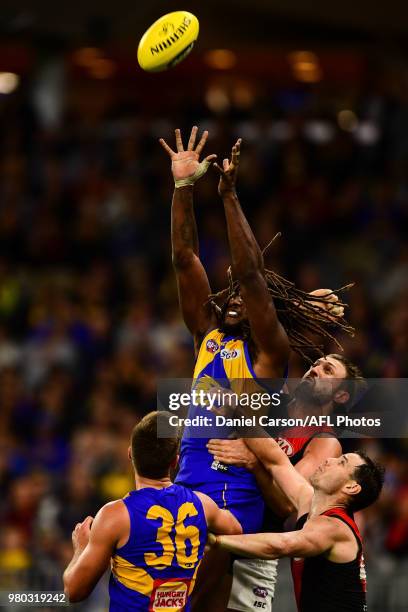 Nic Naitanui of the Eagles attempts a mark during the 2018 AFL round 14 match between the West Coast Eagles and the Essendon Bombers at Optus Stadium...