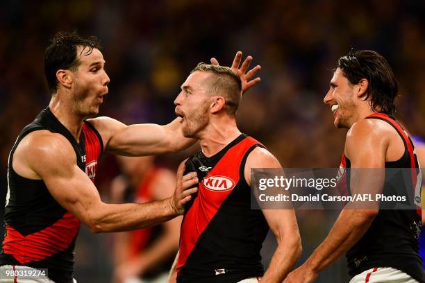 Devon Smith of the Bombers celebrates a goal during the 2018 AFL round 14 match between the West Coast Eagles and the Essendon Bombers at Optus...