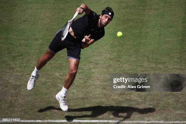 Nikoloz Basilashvili of Georgia serves the ball to Borna Coric of Croatia during their round of 16 match on during day 4 of the Gerry Weber Open at...