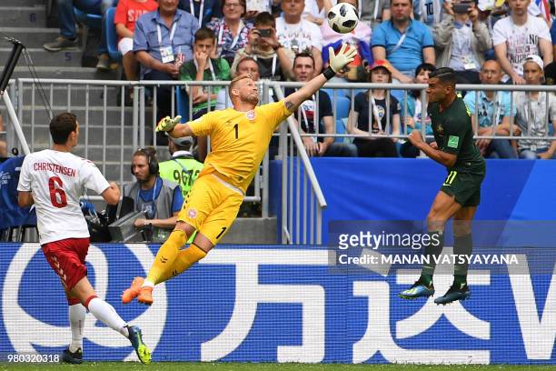 Denmark's goalkeeper Kasper Schmeichel comes for a high ball against Australia's forward Andrew Nabbout during the Russia 2018 World Cup Group C...