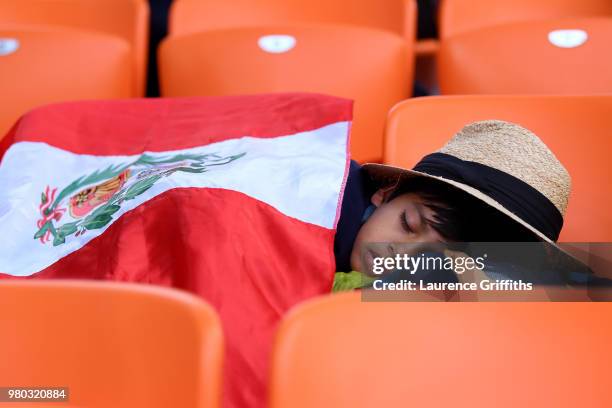 Peru fan sleeps prior to the 2018 FIFA World Cup Russia group C match between France and Peru at Ekaterinburg Arena on June 21, 2018 in...
