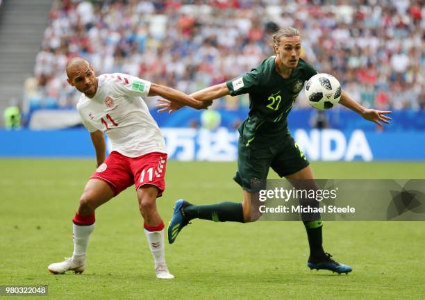 Martin Braithwaite of Denmark challenge for the ball with Jackson Irvine of Australia during the 2018 FIFA World Cup Russia group C match between...