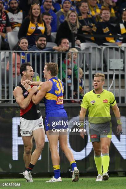 Matt Dea of the Bombers and Jackson Nelson of the Eagles wrestle during the round 14 AFL match between the West Coast Eagles and the Essendon Bombers...