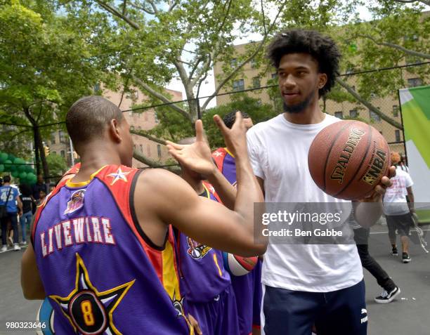 Marvin Bagley III plays a game of ball with fans at the Mtn Dew Kickin' It Courtside @ St. Nick's event on June 20, 2018 in Harlem, New York City.