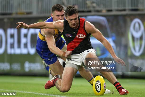 Luke Shuey of the Eagles and Conor McKenna of the Bombers contest for the ball during the round 14 AFL match between the West Coast Eagles and the...