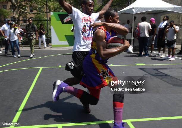 The Harlem Wizards shoot hoops with fans at the Mtn Dew Kickin' It Courtside @ St. Nick's event on June 20, 2018 in Harlem, New York City.