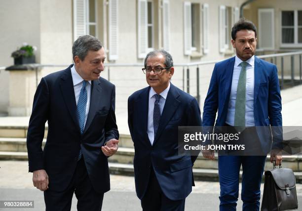 President of the ECB, Mario Draghi talks with Italian Minister of Economy and Finance Giovanni Tria during a Eurogroup meeting at Senningen Castle in...